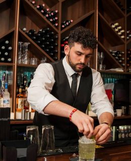 A drink in lovingly prepared at the bar at Suay Pan-Asian restaurant