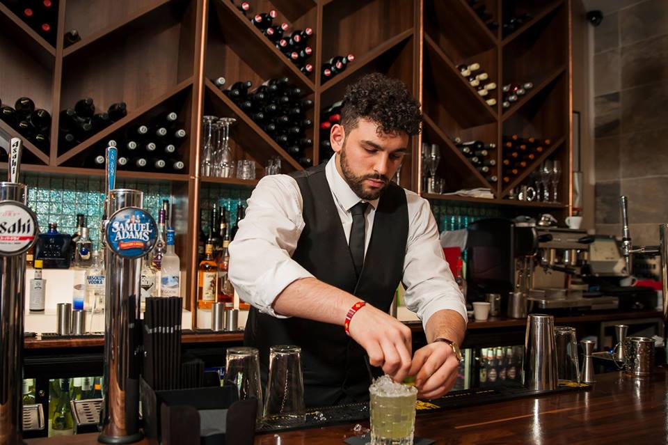 A drink in lovingly prepared at the bar at Suay Pan-Asian restaurant