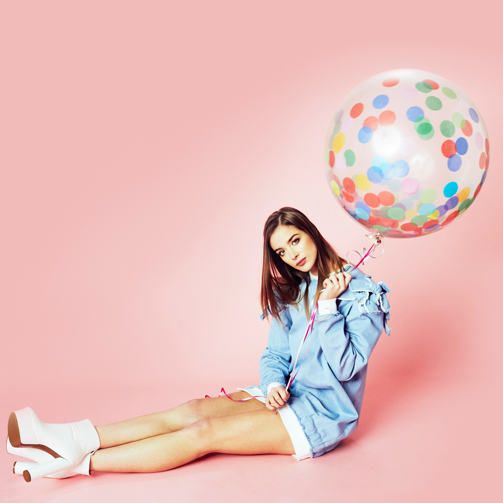 Model poses with a balloon to promote the British Style Collective, Clothes Show