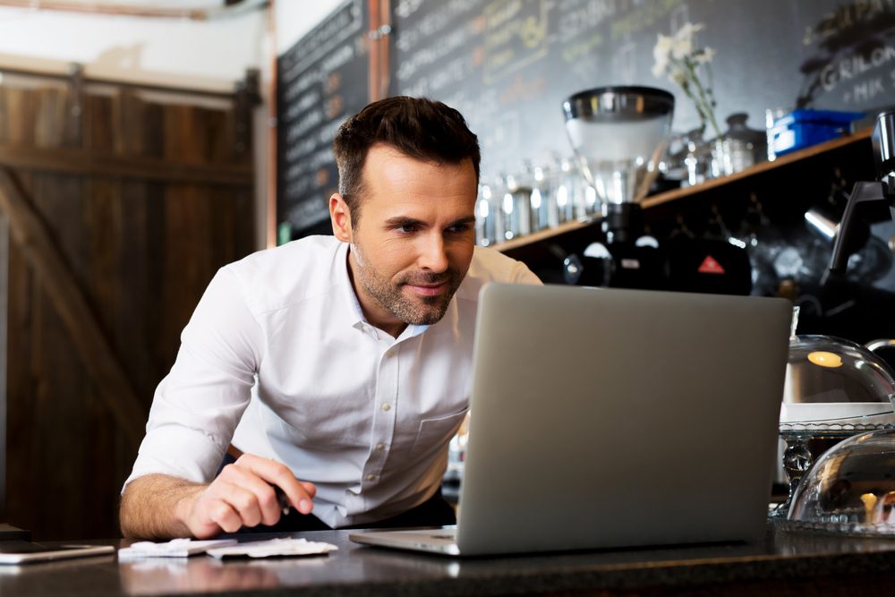 business start-up, man pictured at his laptop