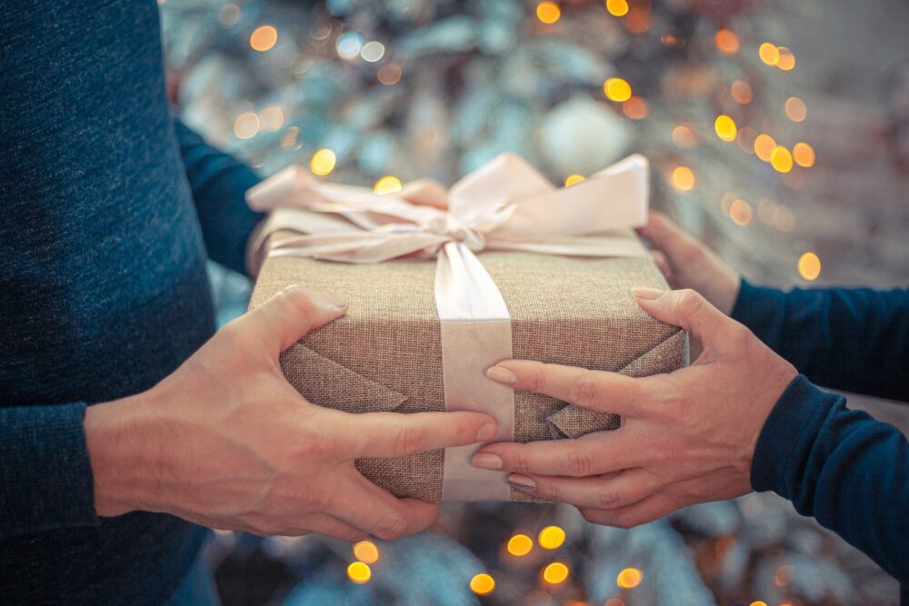 handing over a gift