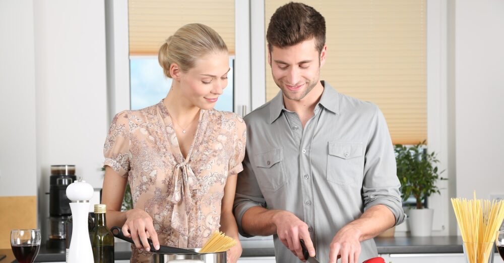 couple cooking in their perfect kitchen