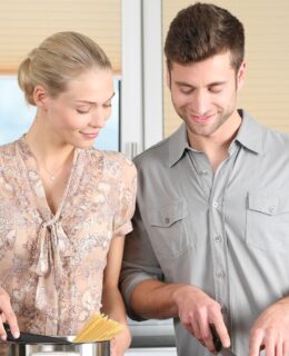 couple cooking in their perfect kitchen