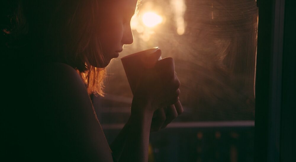 young woman drinking coffee