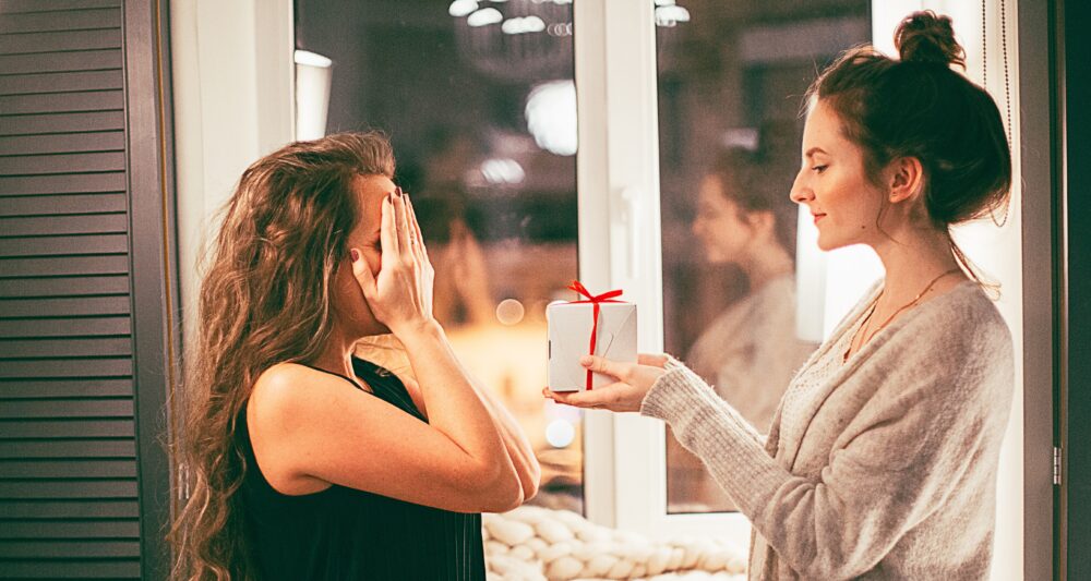 woman giving a gift