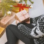 woman unwrapping presents